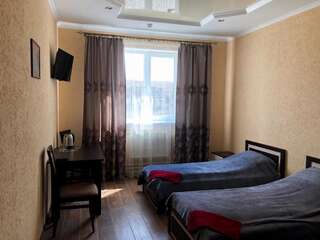 Мотели Уют Отель Барановичи Двухместный номер Делюкс с 2 отдельными кроватями-1