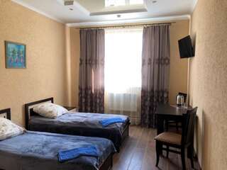 Мотели Уют Отель Барановичи Бюджетный двухместный номер с 2 отдельными кроватями-1